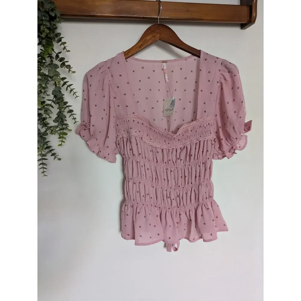 Free People NWT Adore You Smocked Peplum Blouse Pink Mauve Puff Sleeve M